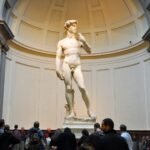 Statue of Michelangelo's David in the Hall of the Colossus at the Uffizi Gallery, Florence.